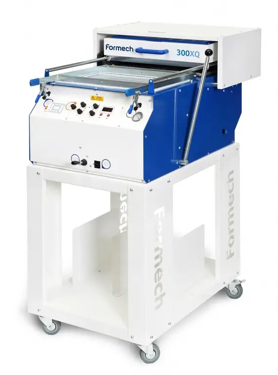 vertical vacuum forming machine